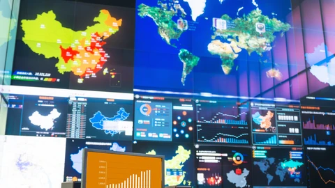 Picture of room full of monitors, monitoring attacks